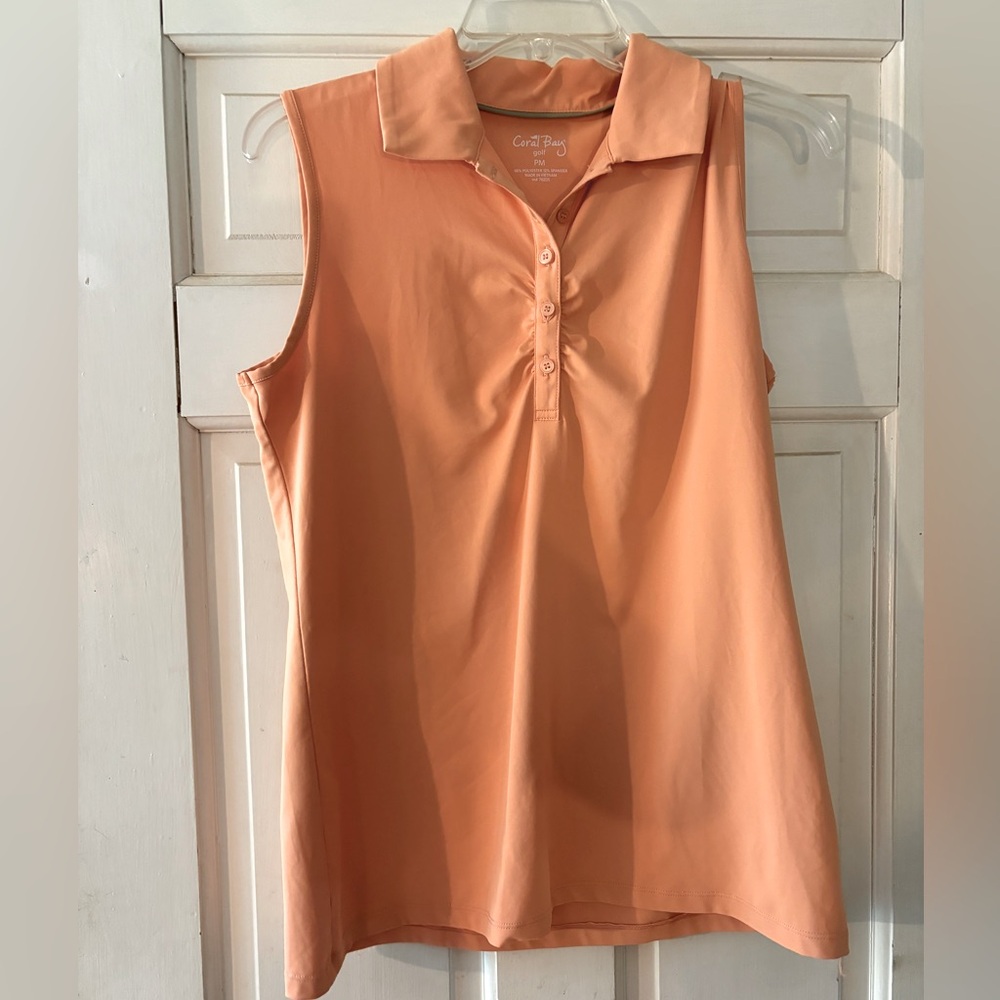 Coral Bay golf women’s orange PM sleeveless polo